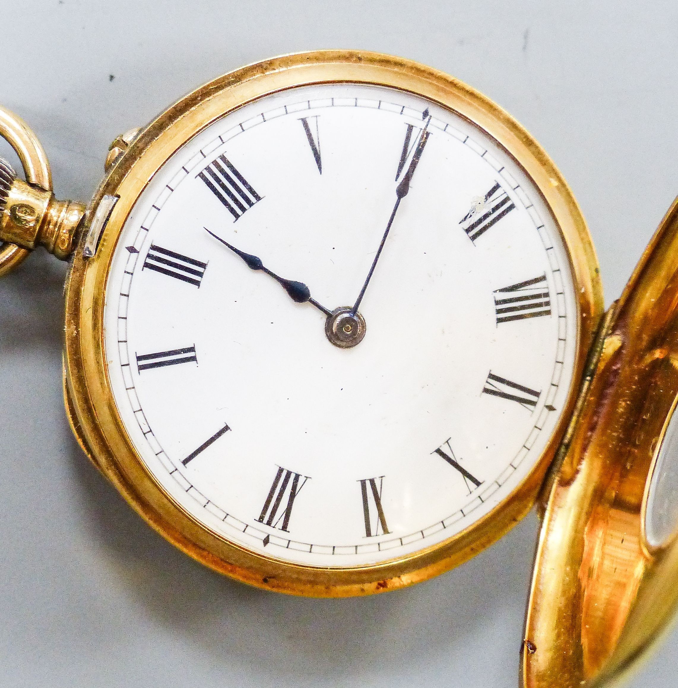 A continental 18k and enamel half hunter pocket watch, case diameter, 38mm, gross weight 42.2 grams.